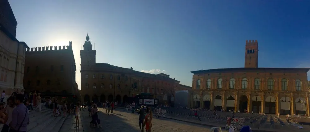 Watching the sunset in Piazza Maggiore during our layover in Bologna, Italy