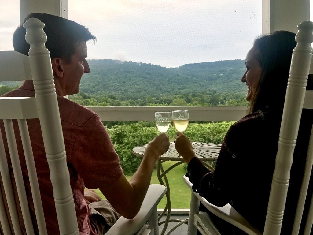 Enjoying a romantic evening on the porch at the Farmhouse at Veritas