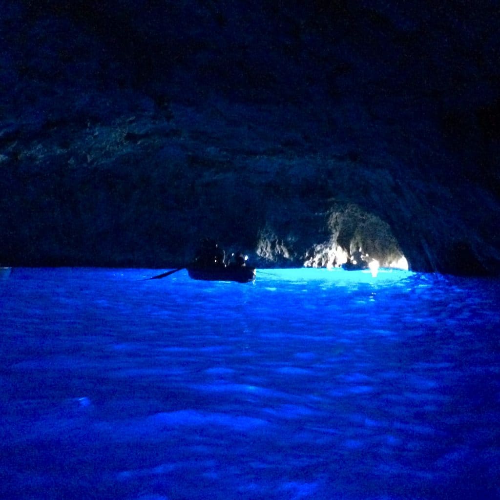 Enjoying a romantic tour at Capri, Italy's Blue Grotto. 