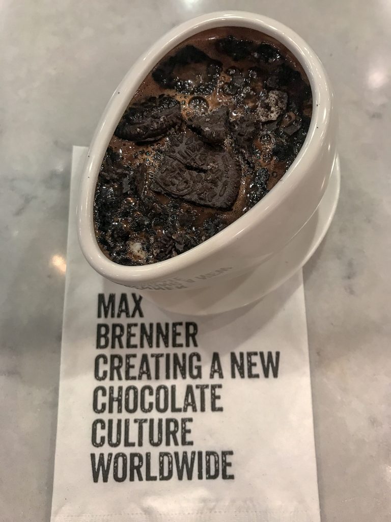 Max Brenner has perfected hot chocolate by creating a Hugmug. It allows you to enjoy hot chocolate perfectly by using bth hands to keep them warm as you "hug" it.
