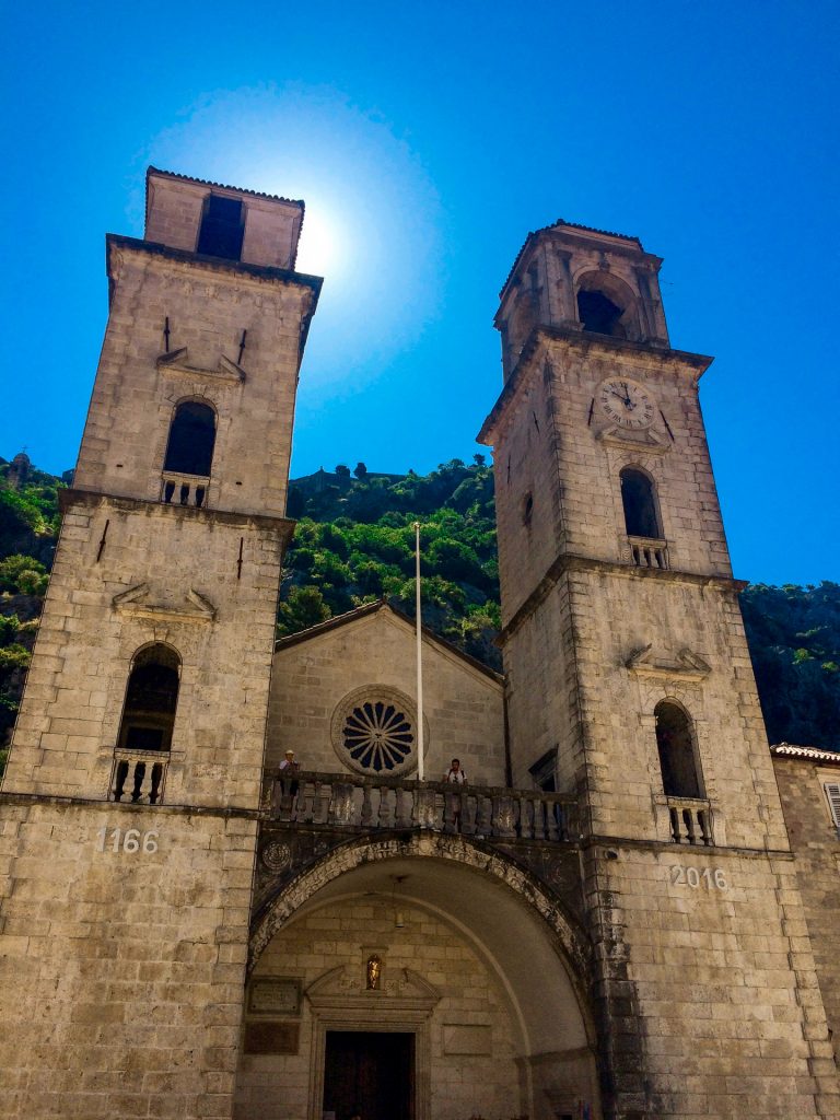 A church in Old Town Kotor with two tall rectangle towers.