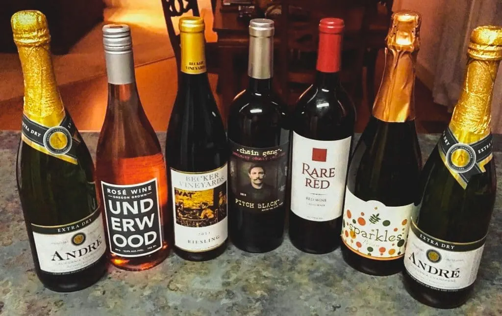 Seven different bottles of wine to enjoy for a girls weekend in Fredericksburg, Texas.