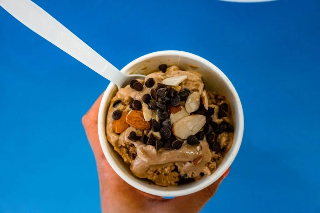 Bird eyes view of liquid nitrogen ice cream inside a cup from iCream Cafe in Frisco. It's coffee ice cream with toasted almonds and chocolate chips.