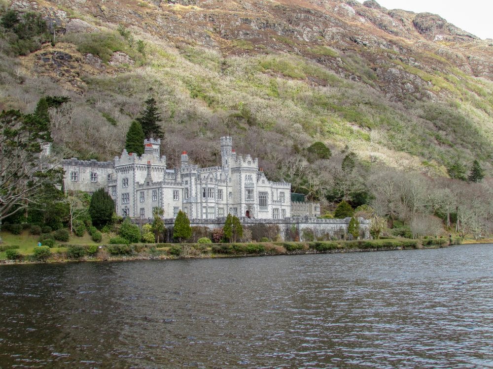 Kylemore Abbey, also known as Kylemore Castle is one of the most beautiful and iconic castles in Ireland. It sits along a long in Connemara National Park.