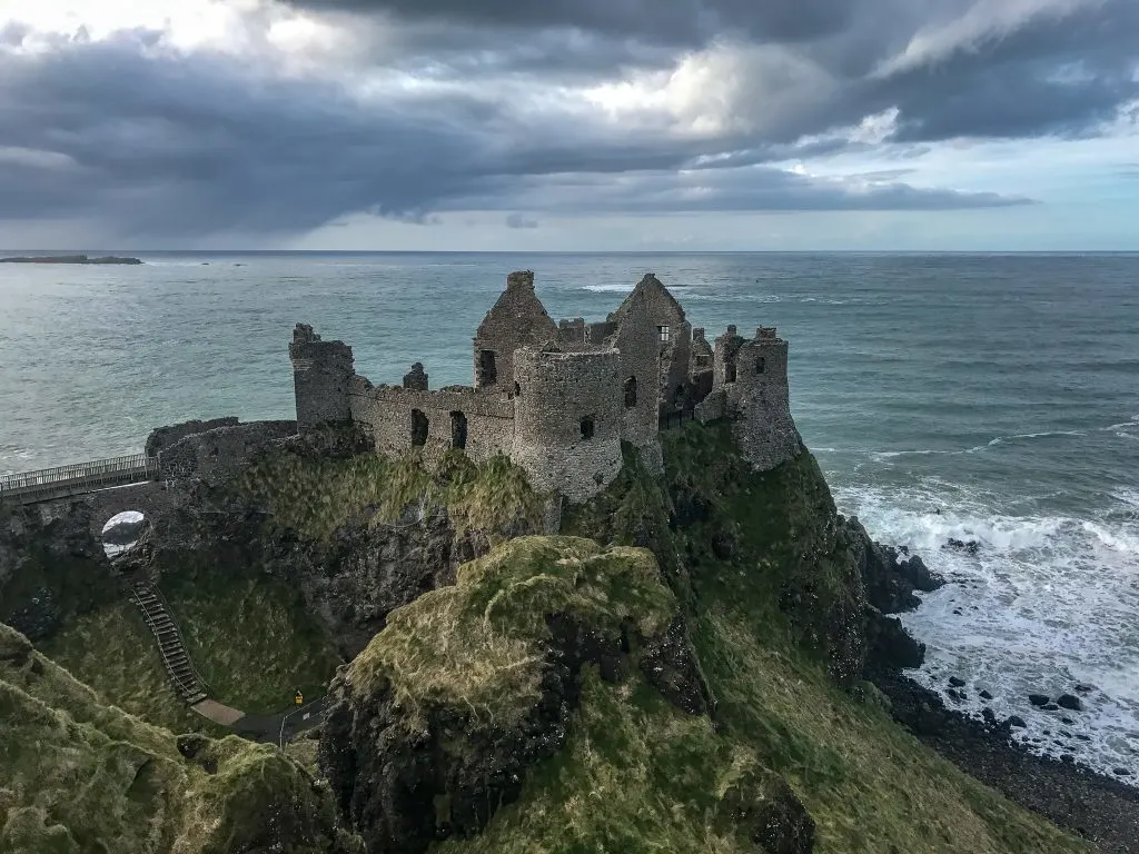 Dunluce Castle sits dramatically along the coast of Northern Ireland. If this castle looks familiar to Game of Thrones fans, it is because it's the castle used to represent the house of Greyjoy. Truly an amazing castle to see in Ireland.