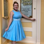 Adults playing dress up at Disneyland by Disneybounding! Adults can wear stylish every day clothes inspired by a Disney character. Here is an example for Disneybounding as Cinderella.