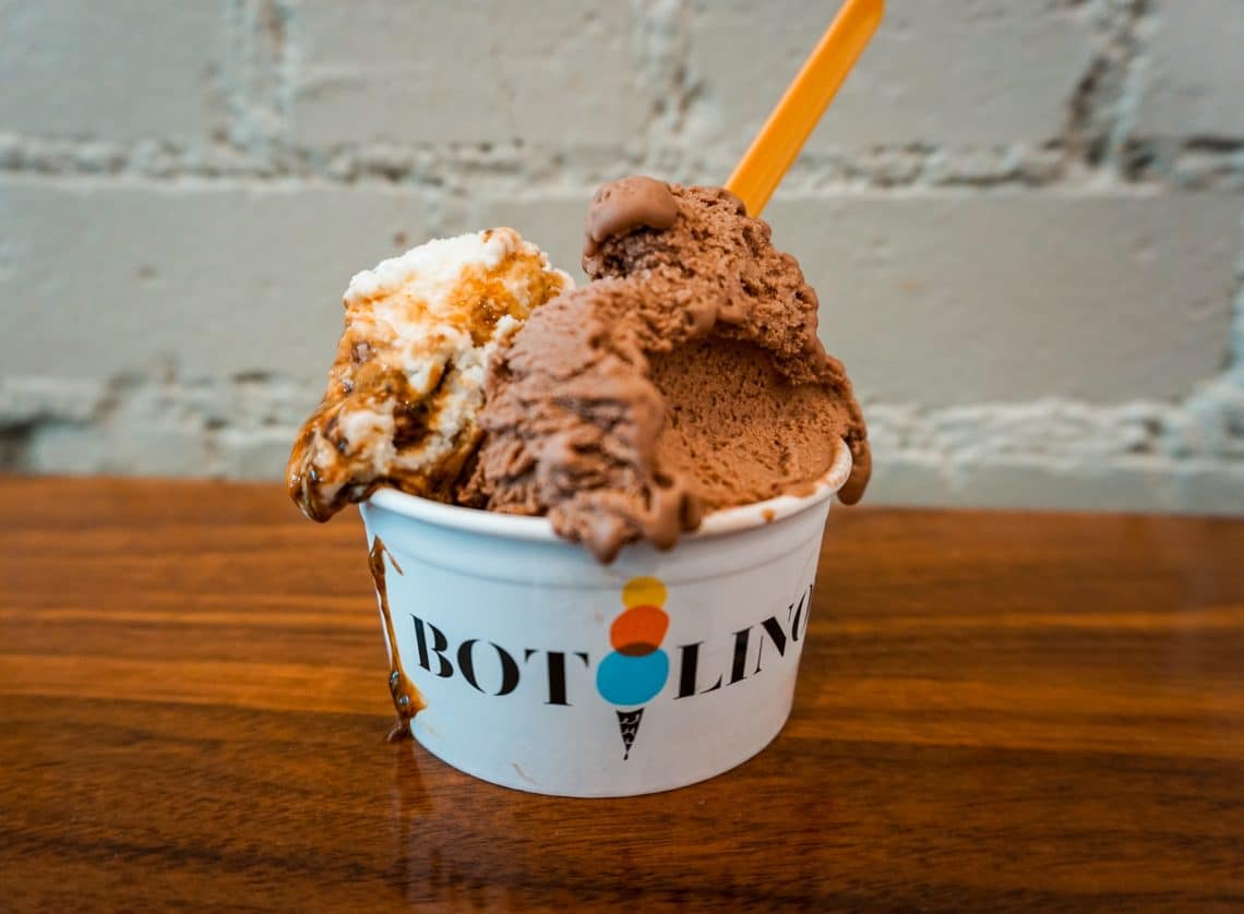 Two scoops of gelato (gianduja on the right) inside a cup from Botolino.