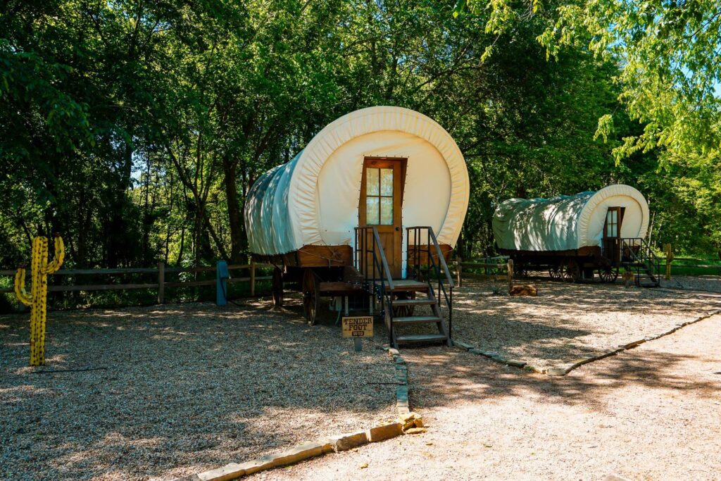 Two Conestoga Covered Wagons tucked away at The Silver Spur Resort in Canton, Texas.