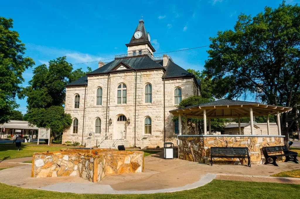 A beautiful limestone Somervell Country Courthouse in Historic Glen Rose Downtown Square.