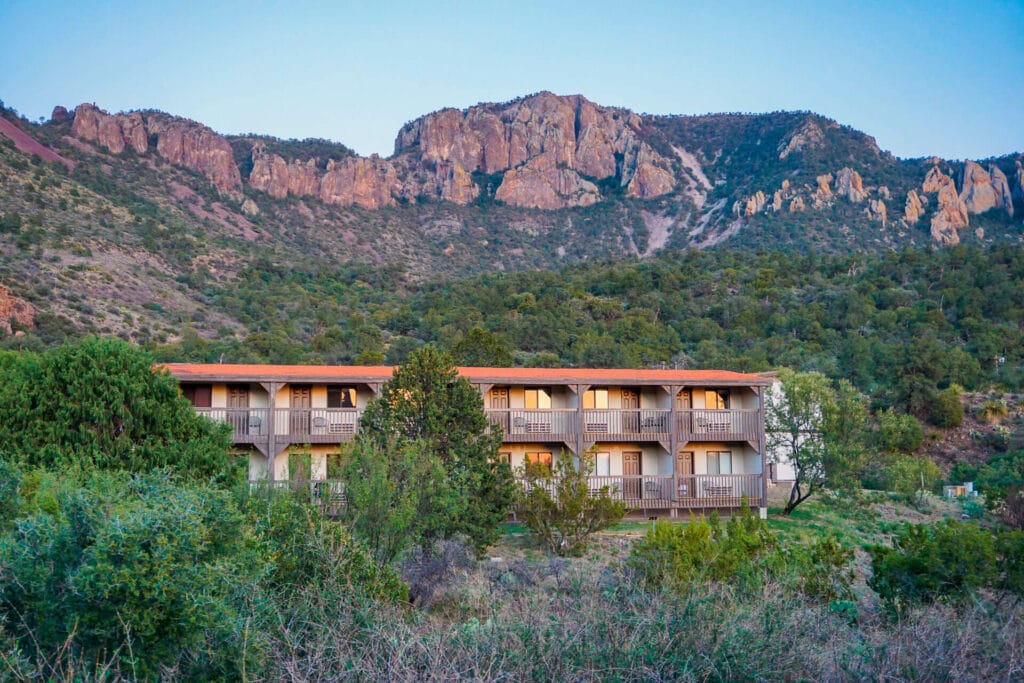 The Chisos Mountains Lodge with the Chisos Mountains in the background. This is the best place to stay in Big Bend National Park.