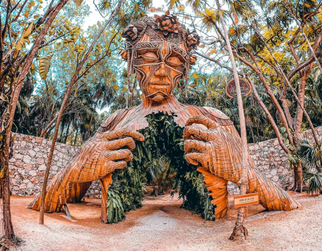 Ven a La Luz - the iconic wooden woman sculpture at Tulum.