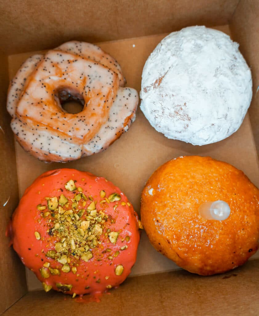 A box of four gourmet donuts from Blue Star Donuts in Portland. Some of the best gourmet donuts ever!