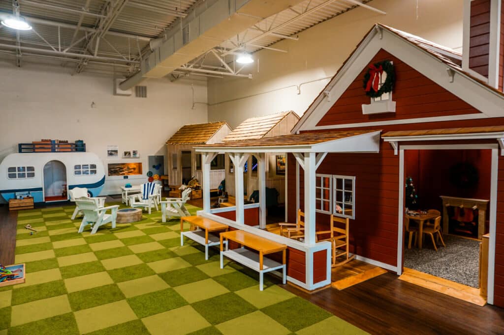 Little play houses inside Play Street Museum in Plano - one of the best things to do in Dallas with toddlers.