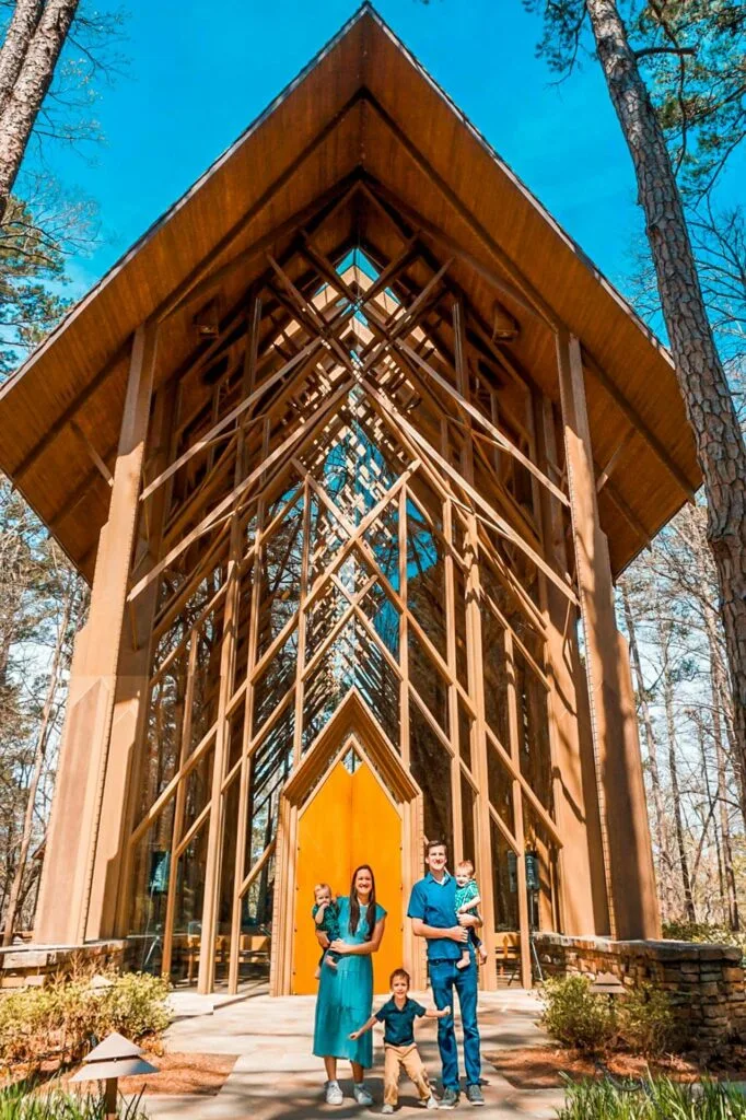 A family in front of Anthony's Chapel at Garvan Woodland Gardens.