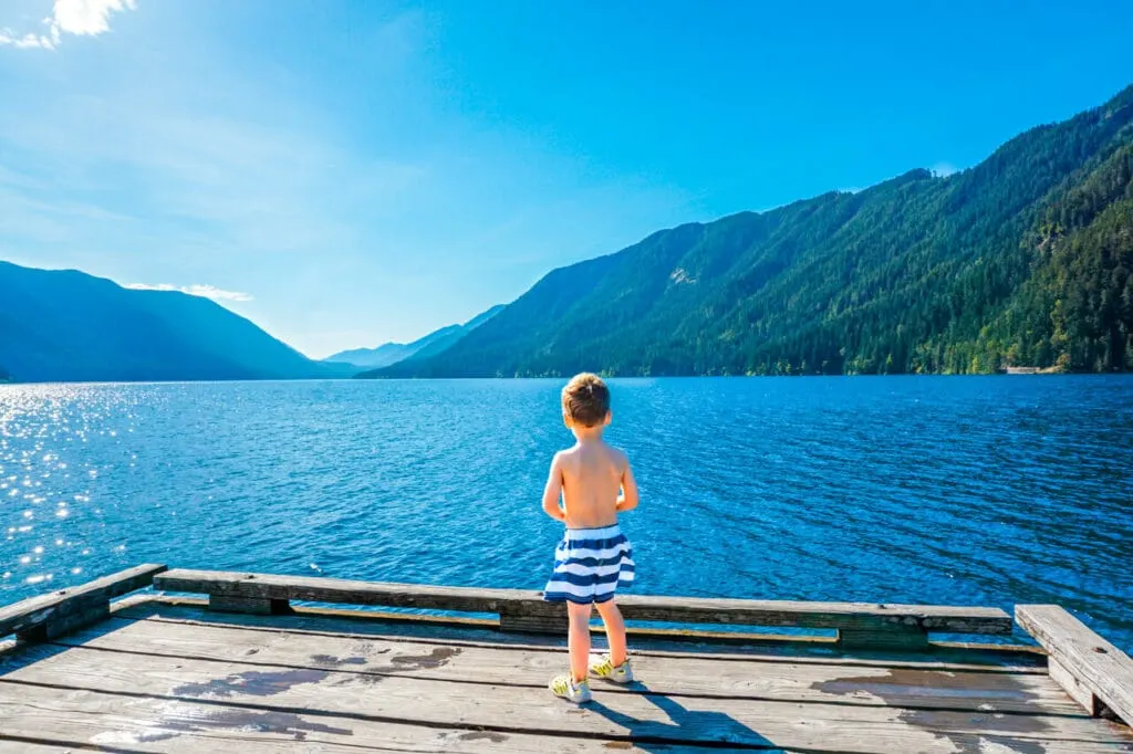 A little boy admiring the beauty of Lake Crescent.