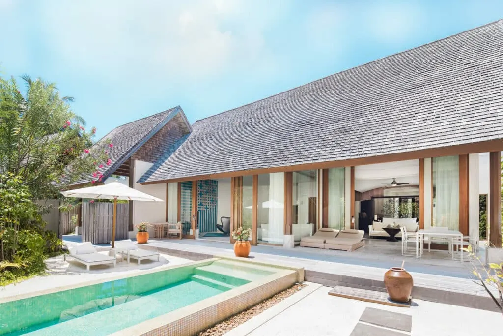The outside of a luxurious three-bedroom beach villa with a private pool at Conrad Maldives Rangali Island.