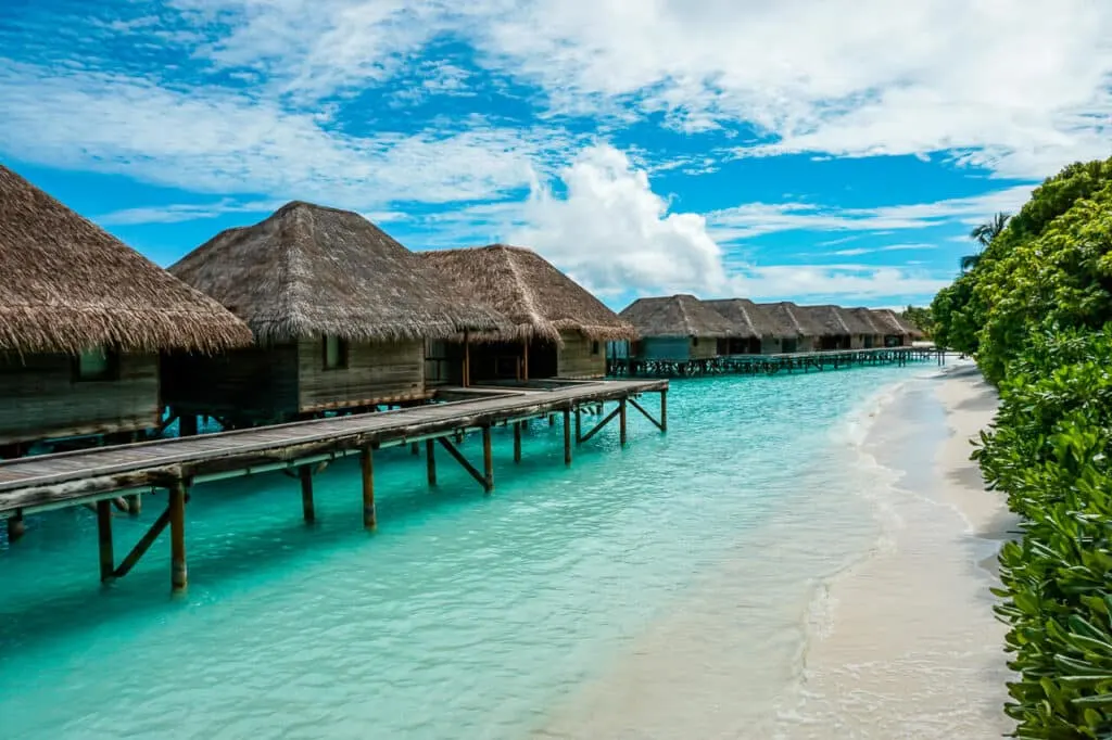 A row of overwater villas at the Conrad Maldives Rangali Island.