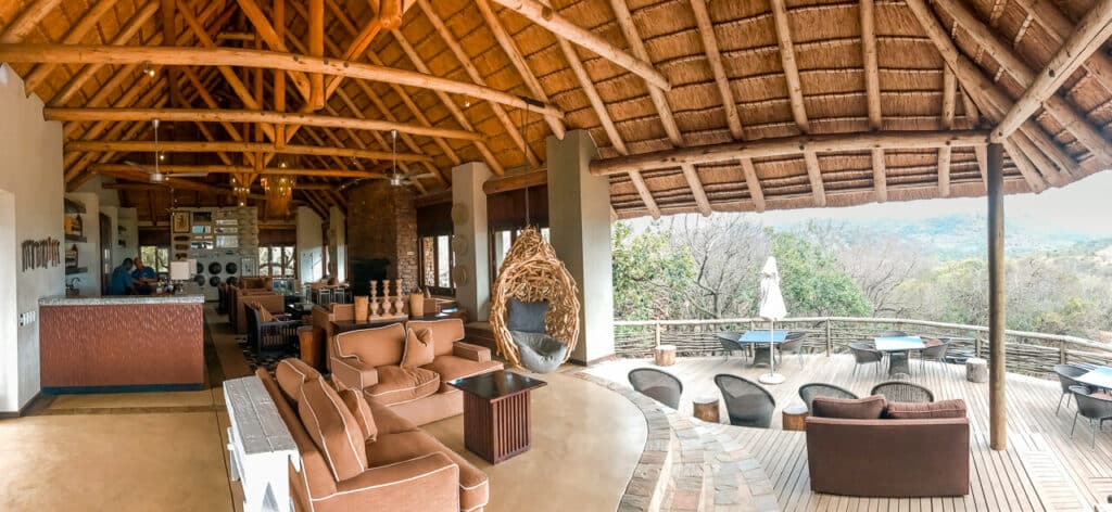 A pano view of AndBeyond Phinda Mountain Lodge lounge and open deck.